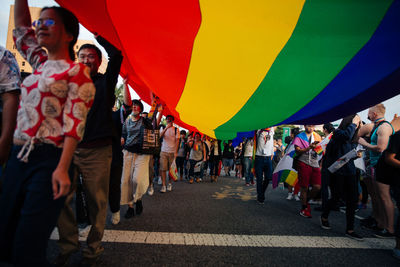 Group of people walking on street