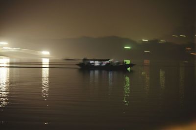 Reflection of illuminated buildings in water