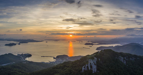 Scenic view of mountains against sky during sunset