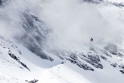 Scenic view of snowcapped mountains during winter