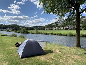 Scenic view of river against sky