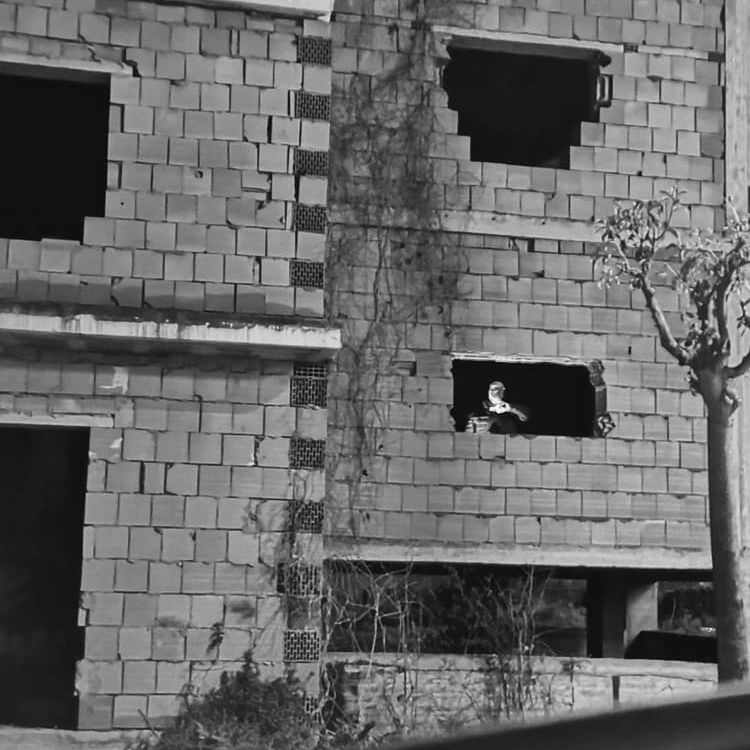 architecture, built structure, wall, brick, black and white, building exterior, black, house, brick wall, monochrome, white, window, monochrome photography, no people, brickwork, wall - building feature, building, day, facade, urban area, damaged, abandoned, old, outdoors, low angle view, iron