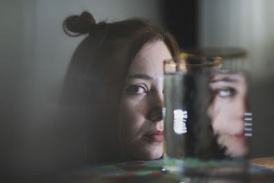 Close-up portrait of woman looking away