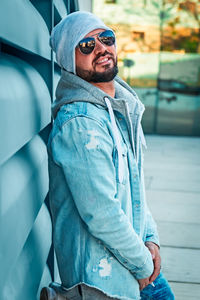 Portrait of young man wearing sunglasses