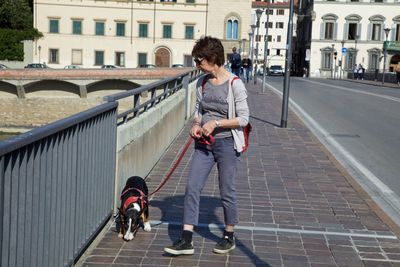 Man walking on street in city