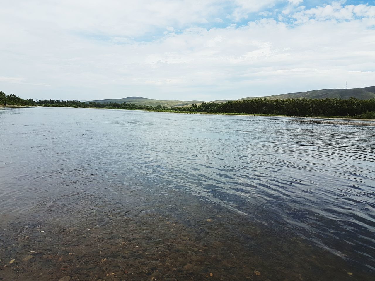 water, sky, tranquil scene, tranquility, scenics, cloud - sky, lake, beauty in nature, reflection, waterfront, nature, cloud, rippled, cloudy, sea, idyllic, calm, day, tree, outdoors