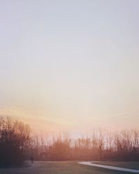 Scenic view of beach against sky during sunset
