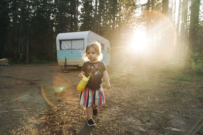 A child walks at sunset at a campsite near mt. hood, oregon.