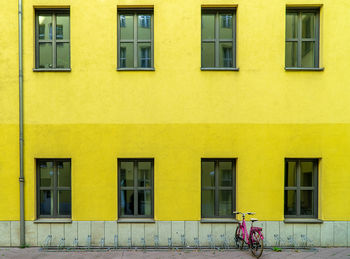 Windows on yellow building