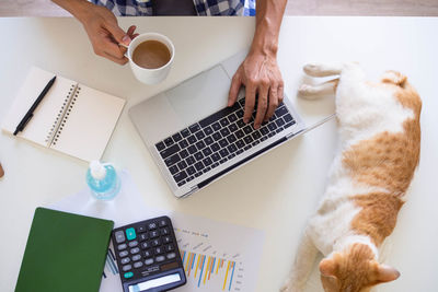 High angle view of coffee cup on table