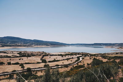 Scenic view of sea against clear blue sky