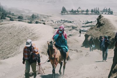 Group of people on the ground during winter