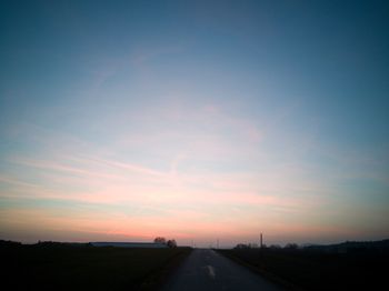 Road against sky during sunset