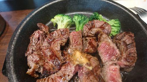 High angle view of meat in cooking pan