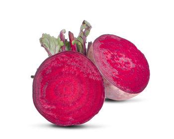 Close-up of red apple against white background