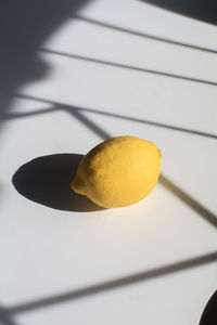 Close-up of lemon on table