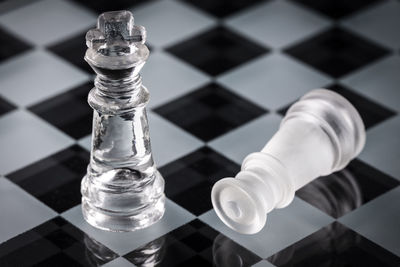 High angle view of chess pieces on table