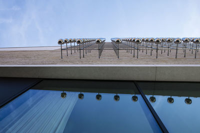 Low angle view of swimming pool against sky