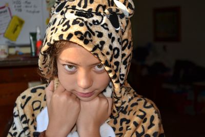 Close-up portrait of teenage girl wearing costume