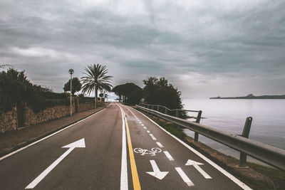 Empty road against sky