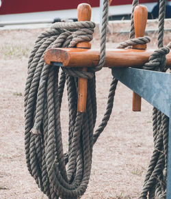 Close-up of rope tied on wood