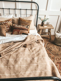 High angle view of sofa on bed at home