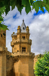 Low angle view of historic building against sky