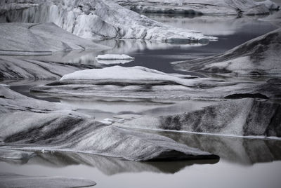 Aerial view of frozen lake icebergs