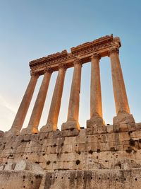 Low angle view of old ruins against clear sky