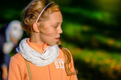 Close-up of girl looking away