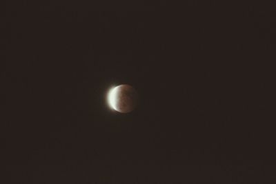 Low angle view of moon in sky