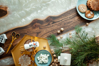 High angle view of christmas decorations on table