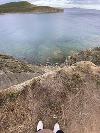 Low section of rocks by sea