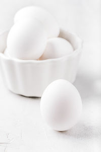 High angle view of eggs in bowl on table