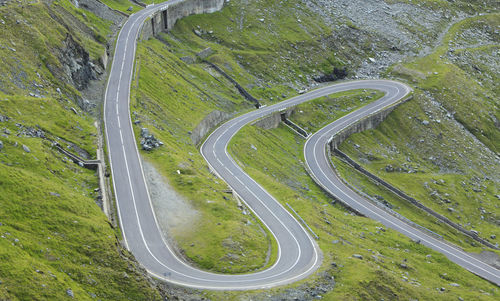 High angle view of winding road in city