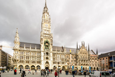 People in front of building