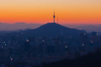 View of cityscape at sunset