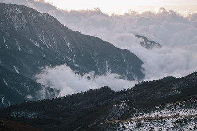 Scenic view of snowcapped mountains against sky