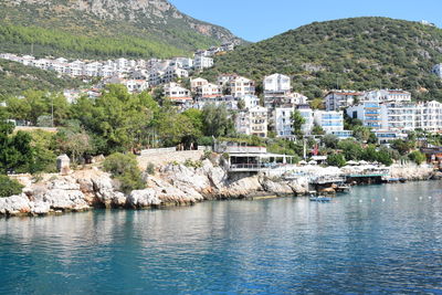 Town by sea and buildings in city