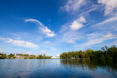 White cloud and blue sky on lake at bang tao beach phuket thailand in sunny day travel time concept.