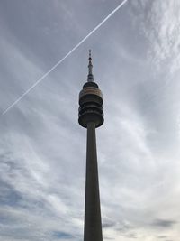 Low angle view of communications tower against sky