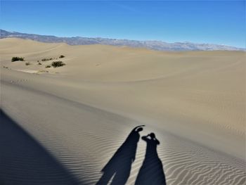 Scenic view of desert against clear sky