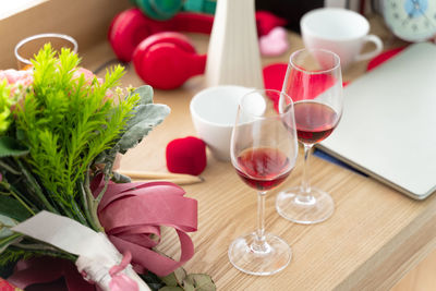 High angle view of wine glasses on table