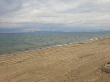 Scenic view of beach against sky