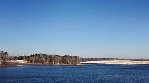 View of sea against blue sky