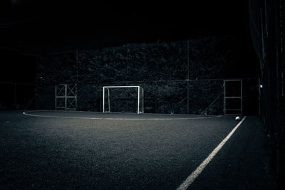 View of basketball hoop at night