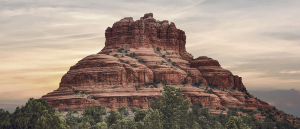 Sedona's iconic bell rock viewed just as the morning sun lights the sky.