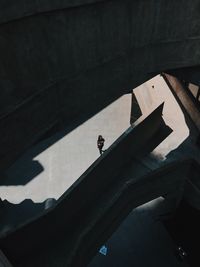 High angle view of woman walking on floor