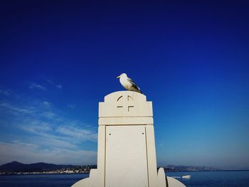 View of lighthouse against blue sky