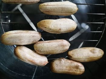 Close-up of bread on metal grate